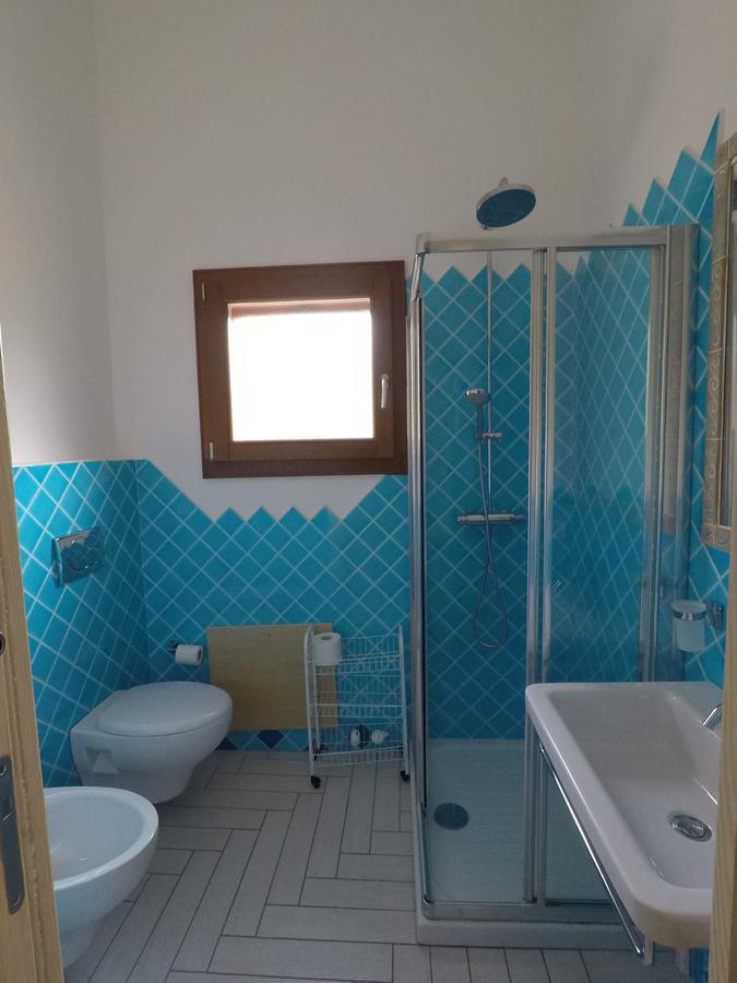 La Corte Degli Ulivi Appartamenti Cala Liberotto Luaran gambar